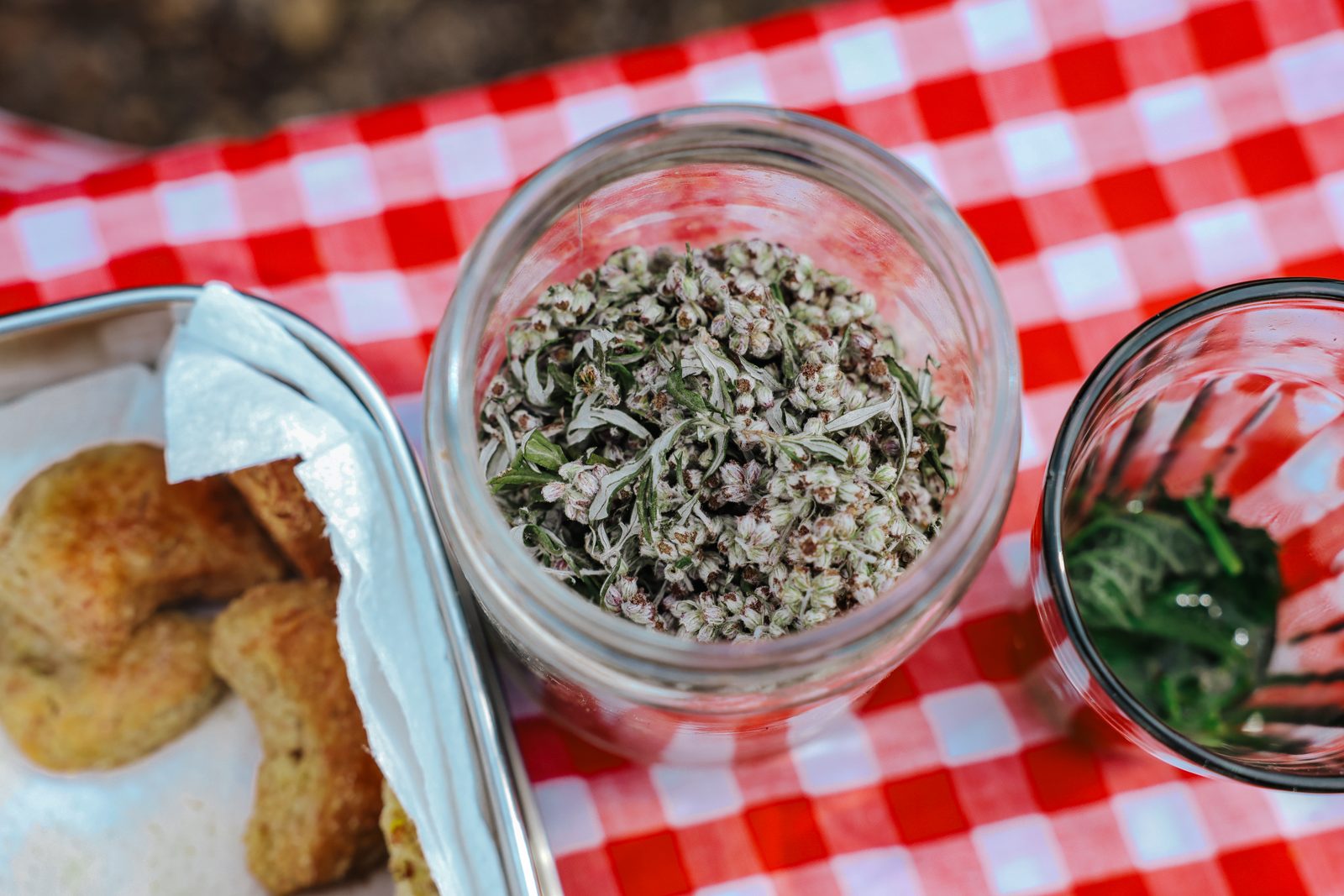 A foraged spread to finish: wild greens, infusions and fresh bread.